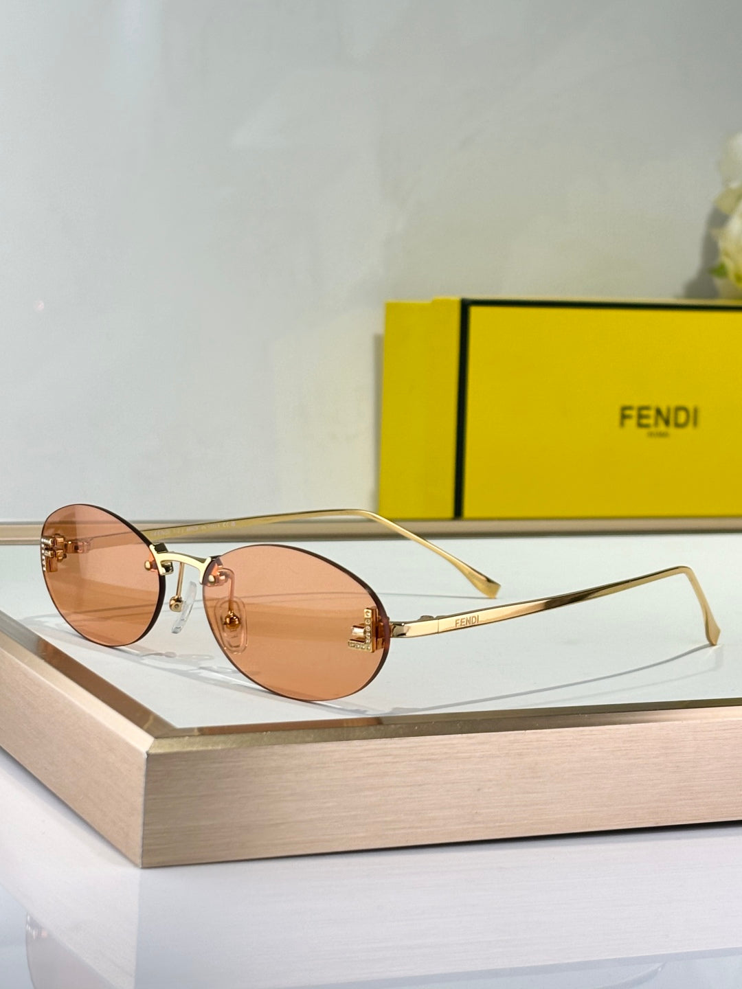 FIRST CRYSTAL RIMLESS OVAL FRAME SUNGLASSES FE4075US IN METAL